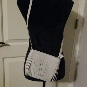 Small shoulder or cross body purse.